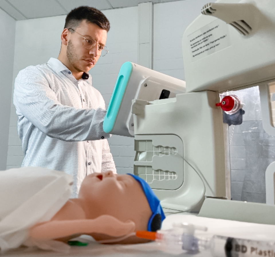 A healthcare professional tests a prototype of the NeoDoppler for a formative evaluation.